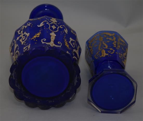 A Bohemian gilt decorated and white enamelled blue glass decanter and matching goblet, late 19th century, 26.5cm and 17.3cm, manufactur